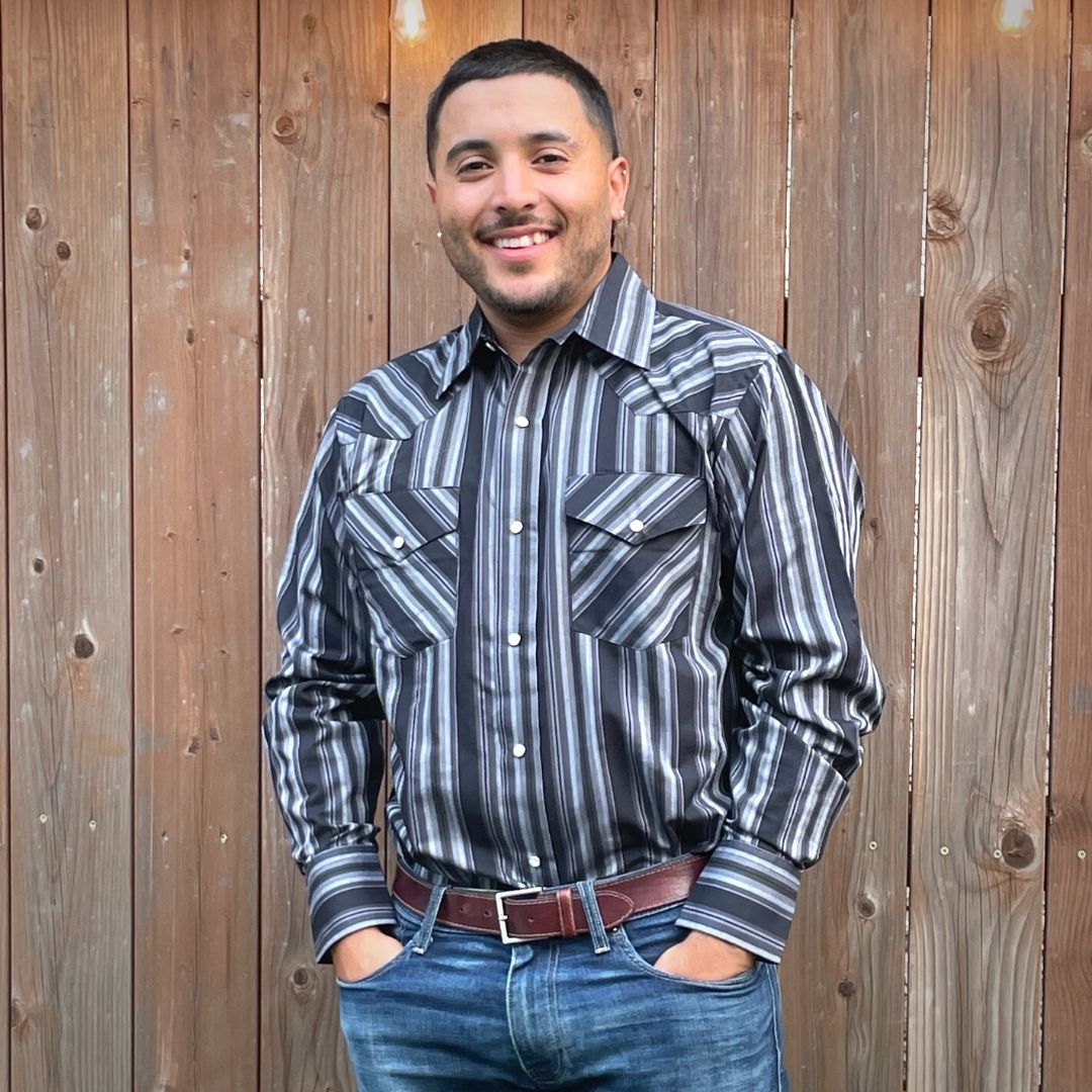 Men's long-sleeve stripe western shirt. Western shirt has black and grey stripes with pearl snap buttons.