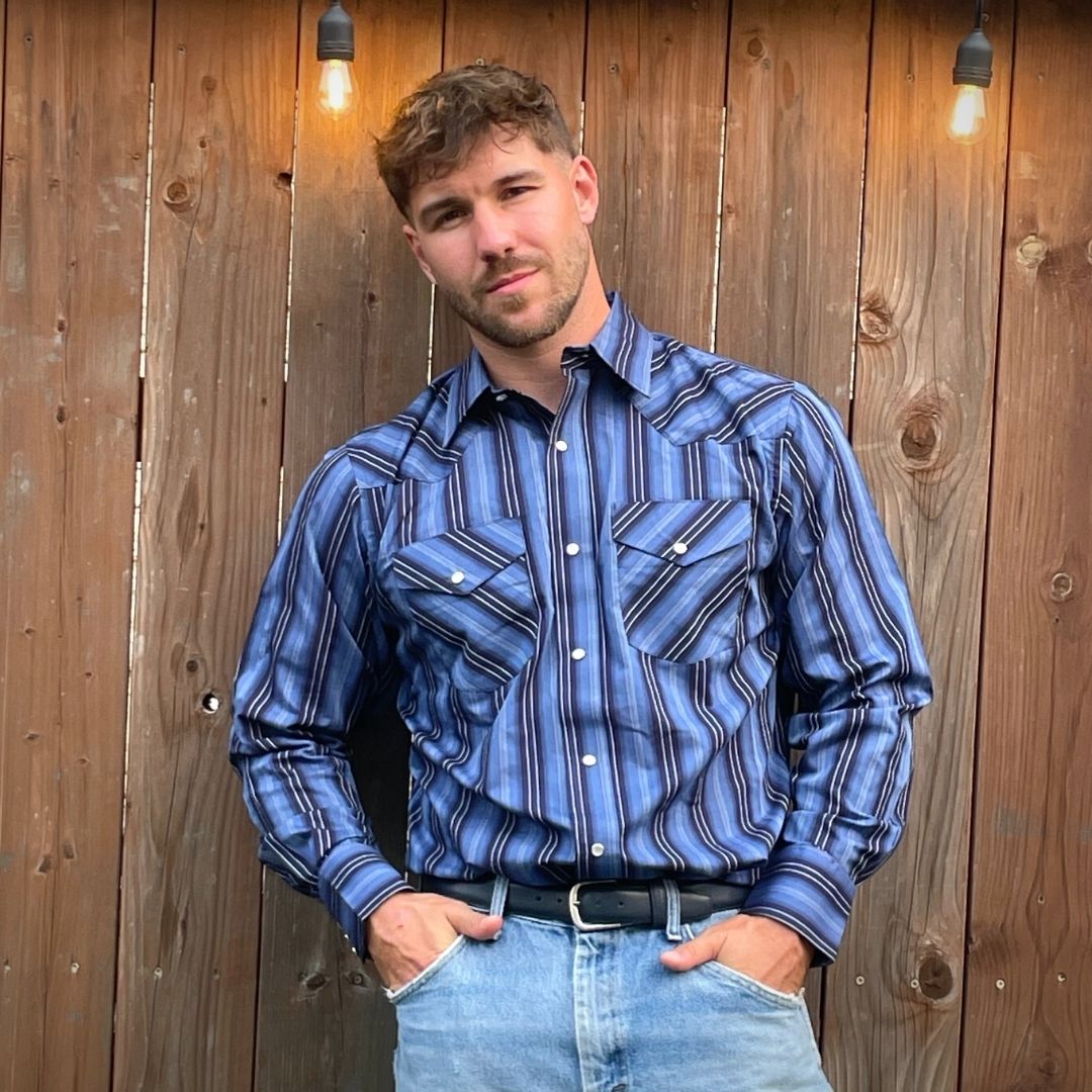 Men's long-sleeve stripe western shirt. Western shirt is blue with black stripes and has pearl snap buttons.