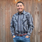 Men's long-sleeve stripe western shirt. Western shirt has black and grey stripes with pearl snap buttons.