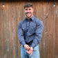 Men's long-sleeve stripe western shirt. Western shirt has navy and grey stripes with pearl snap buttons.
