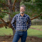 Men's long-sleeve western shirt. Plaid pattern. Pearl snaps.