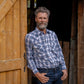 Men's short-sleeve western shirt. Plaid pattern. Pearl snaps.