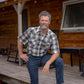 Men's short-sleeve western shirt. Plaid pattern. Pearl snaps.